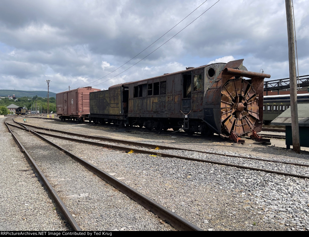 Steam powered rotary plow